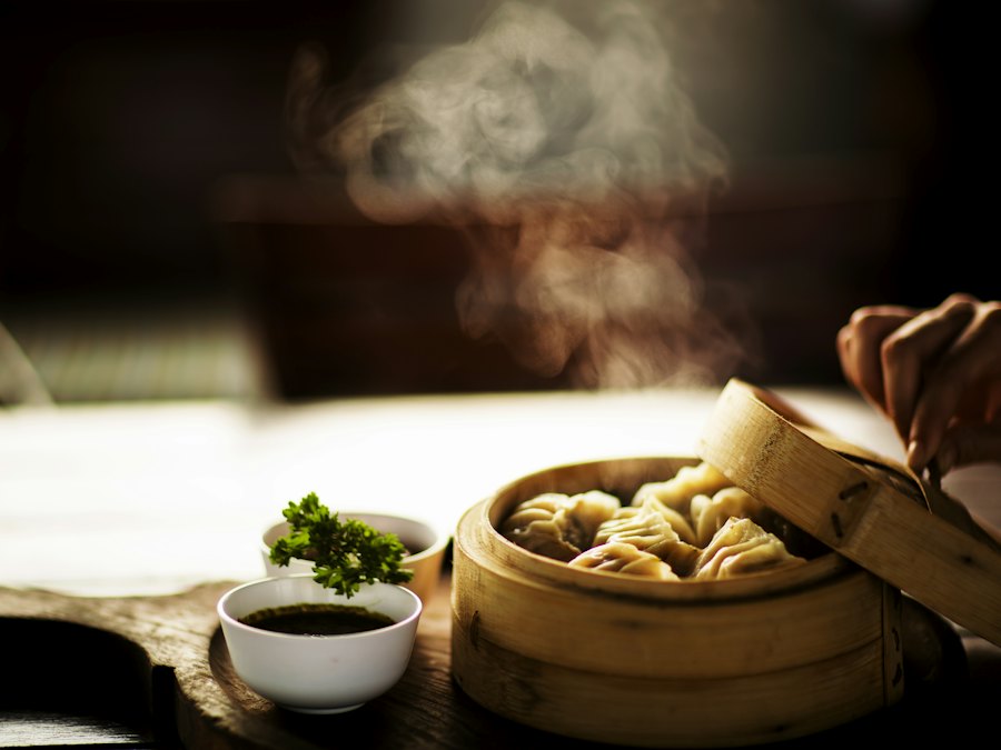 Steamed dumplings in a bamboo steamer