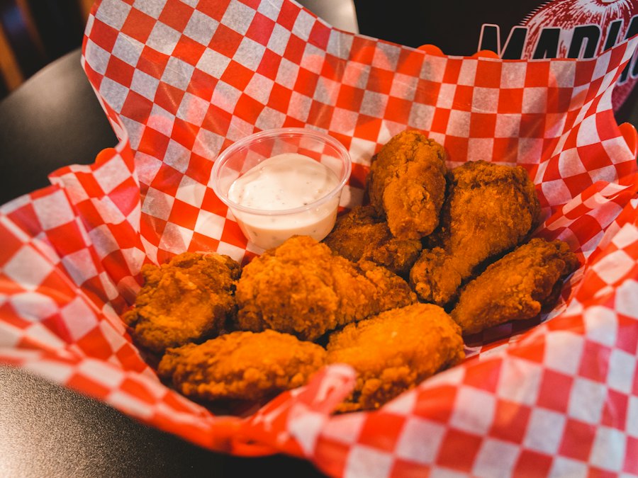 Crispy fried chicken on a white plate