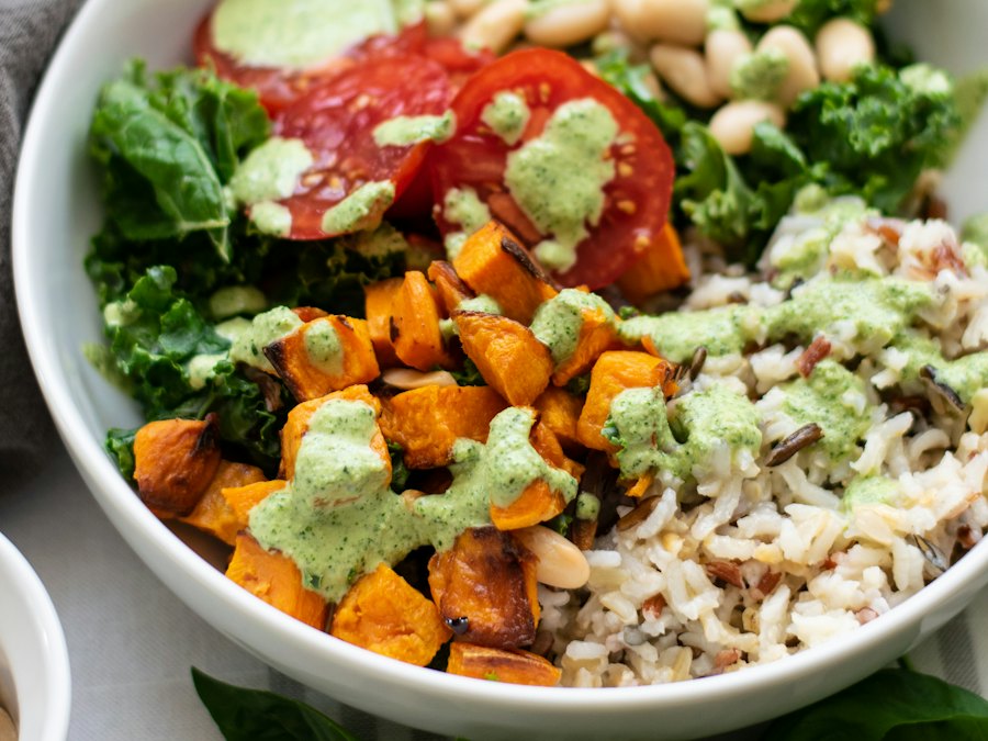 Healthy grain bowl with rice and fresh vegetables
